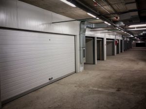 normativa puertas garaje comunidad